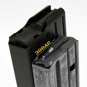 Picture of an AR-15 Magazine Next To a 308 AR Magazine